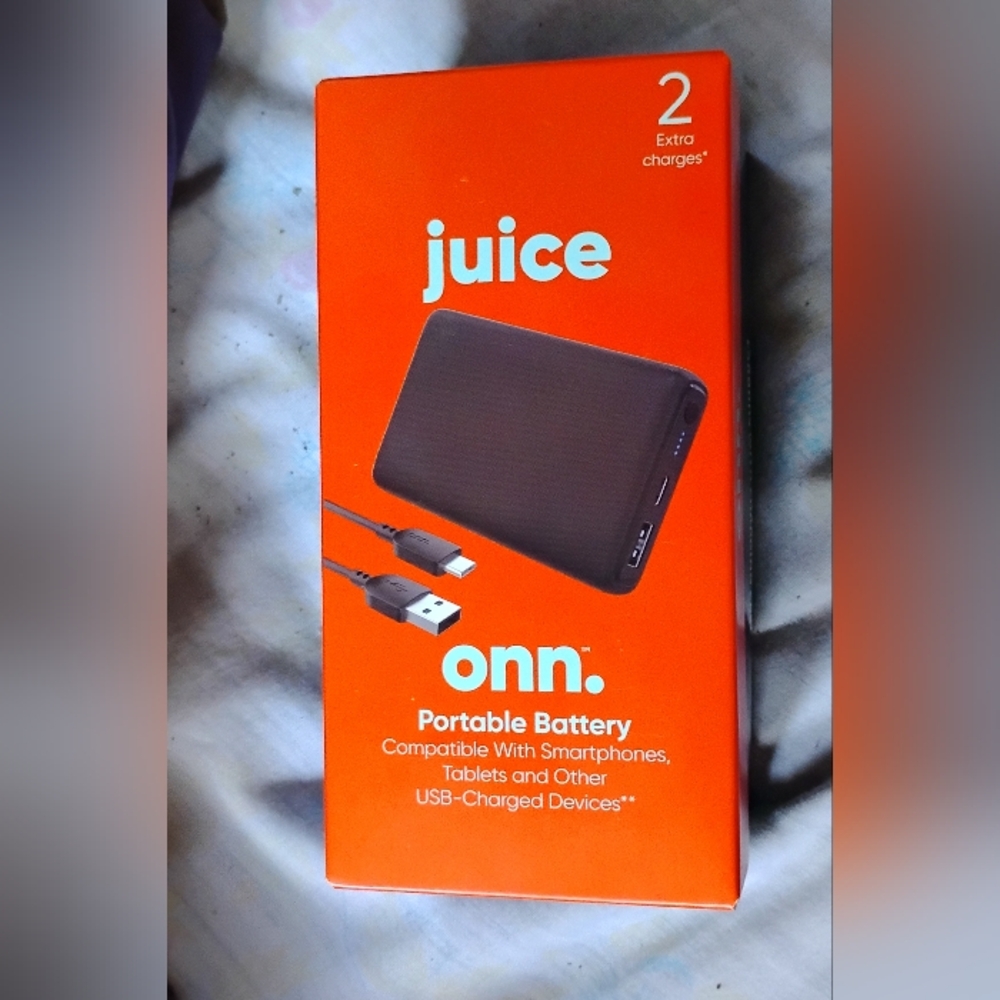 O n n portable battery/ wireless earbuds both brand new in the box.